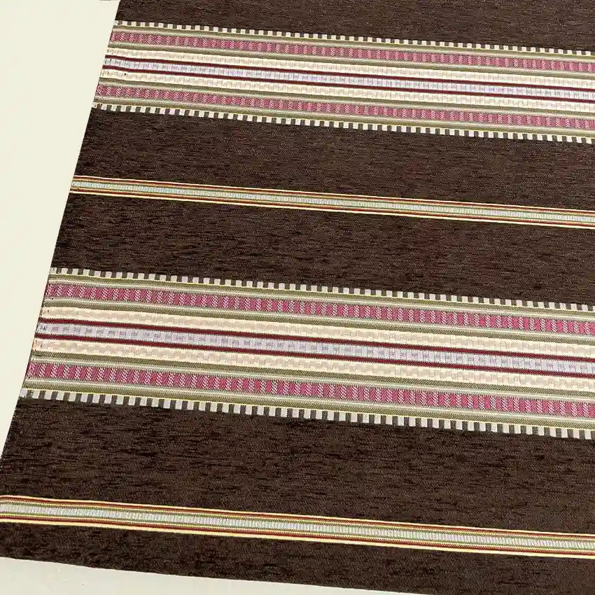 The image shows Longan Craft's Striped Jacquard Chenille Fabric by the yard—100% poly chenille with multicolor horizontal stripes and a textured design, ideal for cushions or upholstery, displayed on a light floor.