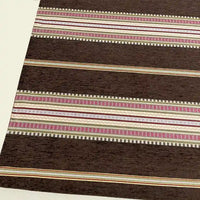 The image shows Longan Craft's Striped Jacquard Chenille Fabric by the yard—100% poly chenille with multicolor horizontal stripes and a textured design, ideal for cushions or upholstery, displayed on a light floor.