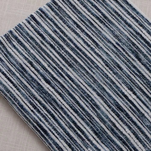 A Longan Craft Striped Jacquard Chenille Fabric By The Yard features durable, colorful poly woven stripes in blue, gray, and white—ideal as stylish upholstery material for modern interiors.
