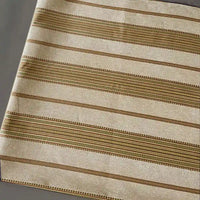 A close-up of Longan Craft’s Striped Jacquard Chenille Fabric by the yard, featuring beige with brown, tan, and gold stripes—100% poly chenille upholstery material ideal for elegant cushions and home décor.