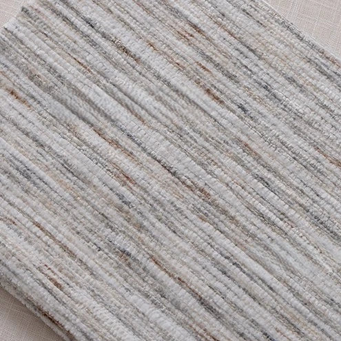 A close-up of Longan Craft's Striped Jacquard Chenille Fabric By The Yard shows its colorful poly woven material with durable, soft chenille texture and subtle stripe pattern, ideal for upholstery.