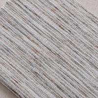 A close-up of Longan Craft's Striped Jacquard Chenille Fabric By The Yard shows its colorful poly woven material with durable, soft chenille texture and subtle stripe pattern, ideal for upholstery.