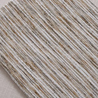 A close-up of Longan Craft’s Striped Jacquard Chenille Fabric By The Yard reveals vertical, wavy lines in beige, taupe, cream, and white on a durable, colorful poly woven chenille material with a soft striped pattern over plain upholstery.