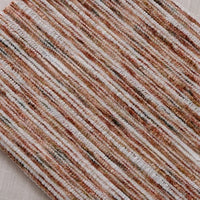 A close-up of Striped Jacquard Chenille Fabric By The Yard by Longan Craft, a durable poly woven upholstery material featuring horizontal brown, beige, white, and rust stripes—perfect for colorful chenille upholstery projects.