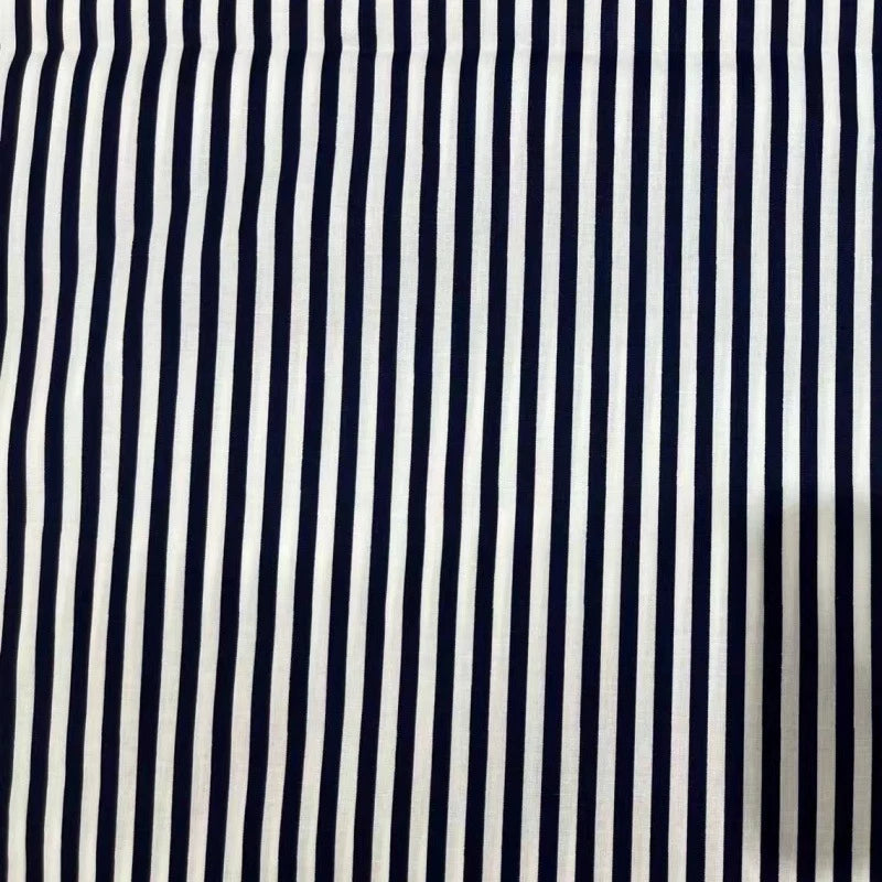 Longan Craft’s Striped Print Lawn Fabric by the yard features navy blue and white vertical stripes on pure cotton—perfect, soft lawn material for shirts.