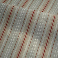 Experience the soft texture and vibrant linear pattern of the Striped Printed Linen Fabric By The Yard by Longan Craft, a breathable cotton linen blend featuring colorful vertical stripes of varying thicknesses. Shown in a close-up with gentle folds, this fabric’s detailed stripe design makes it perfect for dresses and creative projects.