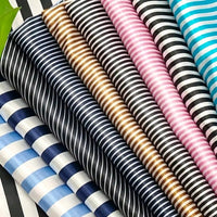 Longan Craft’s Striped Printed Satin Fabric by the Yard features shiny, alternating thick and thin stripes—premium satin material ideal for dressmaking and creative projects.