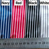 Four pieces of Longan Craft Striped Printed Satin Fabric By The Yard in navy, red, black, and white display crisp white vertical stripes. A ruler shows scale for this premium dressmaking satin material with a shiny stripe pattern.