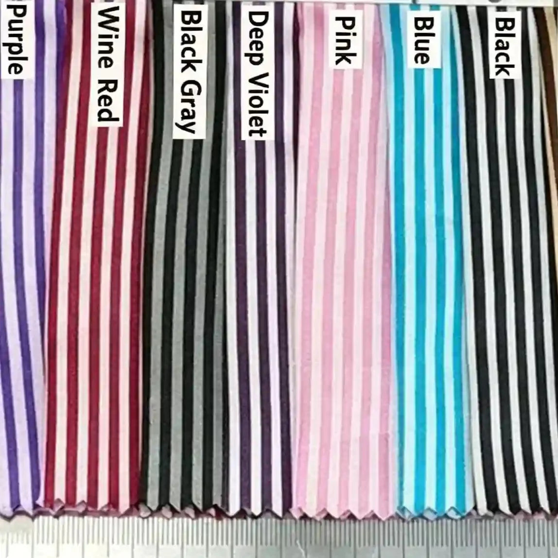 Eight pieces of Longan Craft Striped Printed Satin Fabric By The Yard—shown in Purple, Wine Red, Black Gray, Deep Violet, Pink, Blue, Black, and Brown—are displayed with a ruler to showcase this premium dressmaking material's shiny stripe pattern.
