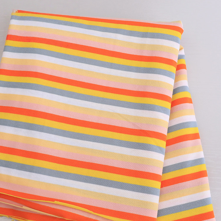 Longan Craft Striped Jersey Fabric by the yard features stretchable cotton spandex with horizontal yellow, orange, pink, gray, and white stripes—perfect for comfy DIY short sleeves.