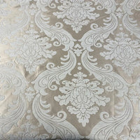 The Longan Craft Thick Chenille Damask Fabric By The Yard features a vintage jacquard damask pattern in light beige and white, ideal for curtain or upholstery projects. Ornate floral and leaf motifs add elegance to this textured chenille fabric.