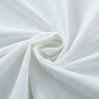 A close-up of Longan Craft Thick Cotton Gabardine Fabric by the yard, twisted to highlight its plain twill weave, smooth texture, and soft, sturdy folds—perfect for uniforms and more.