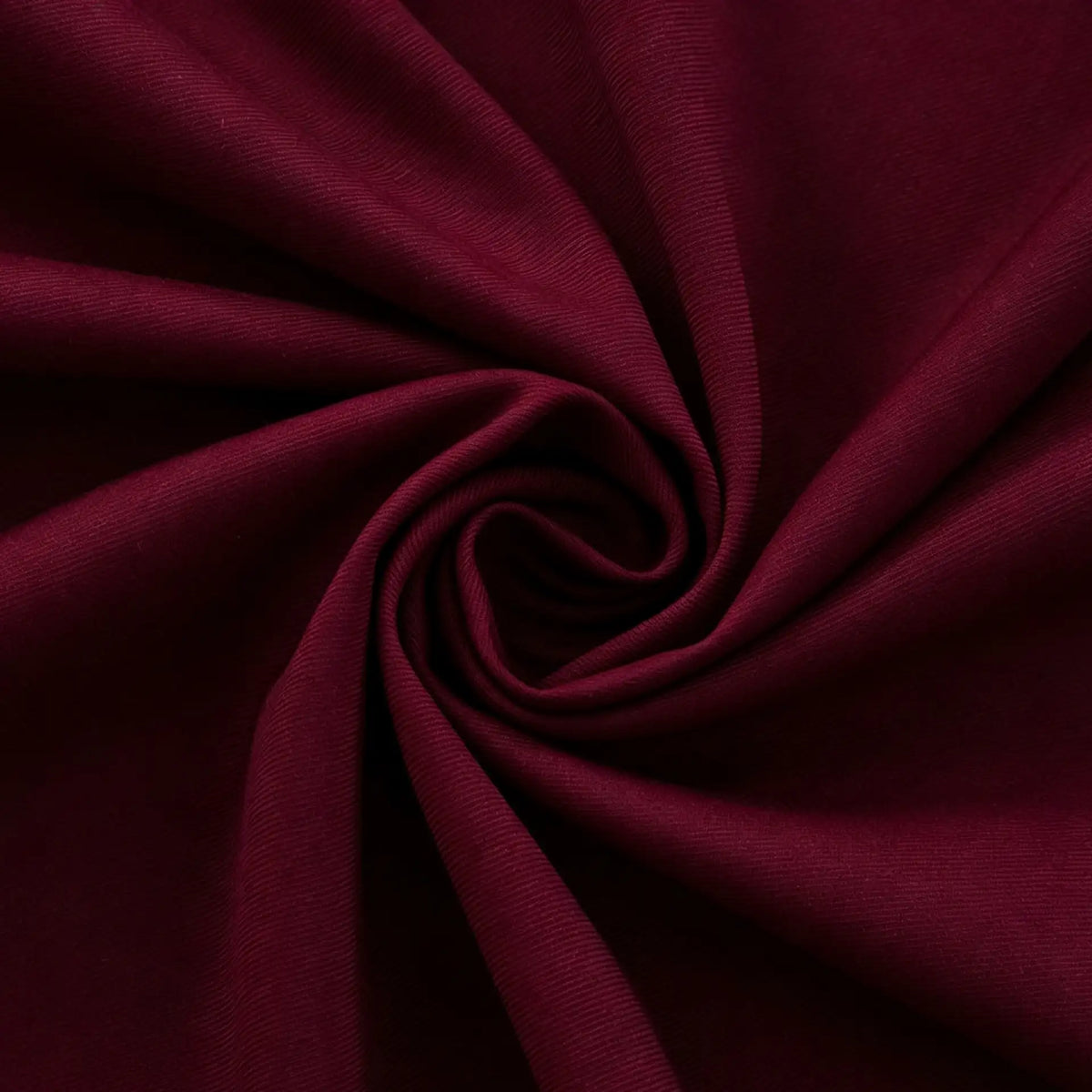Deep red Thick Cotton Gabardine Fabric By The Yard from Longan Craft, featuring a soft, heavyweight twill texture with gathered, spiral folds—durable cotton-polyester gabardine ideal for uniforms and crafts.