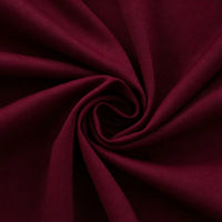 Deep red Thick Cotton Gabardine Fabric By The Yard from Longan Craft, featuring a soft, heavyweight twill texture with gathered, spiral folds—durable cotton-polyester gabardine ideal for uniforms and crafts.