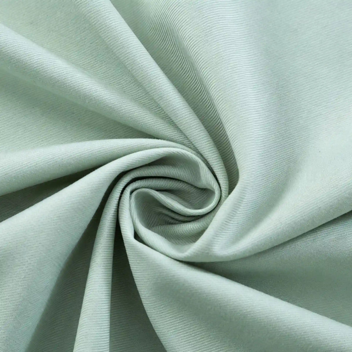 Longan Craft's Thick Cotton Gabardine Fabric by the Yard features a light green, plain color twill weave with a smooth texture and soft folds—ideal material for uniforms.