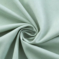 Longan Craft's Thick Cotton Gabardine Fabric by the Yard features a light green, plain color twill weave with a smooth texture and soft folds—ideal material for uniforms.