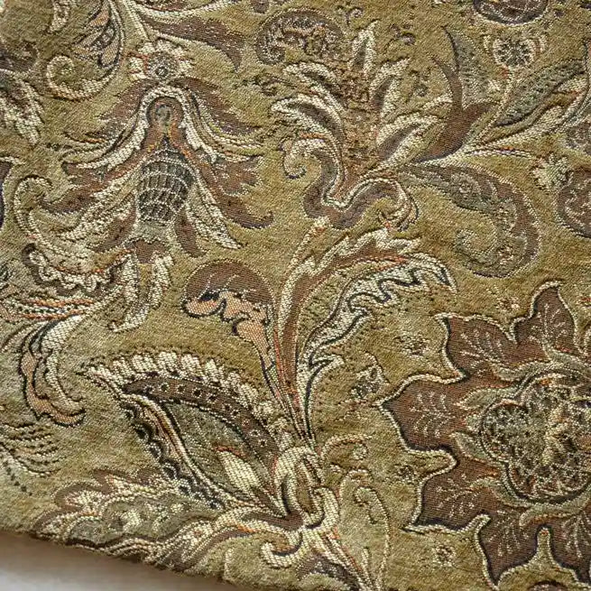 A close-up of Longan Craft’s Thick Viscose Chenille Fabric By The Yard, a durable botanical jacquard chenille material with intricate floral and leaf patterns in muted gold, brown, and beige—ideal for elegant draperies.