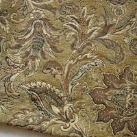 A close-up of Longan Craft’s Thick Viscose Chenille Fabric By The Yard, a durable botanical jacquard chenille material with intricate floral and leaf patterns in muted gold, brown, and beige—ideal for elegant draperies.