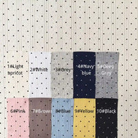 Ten swatches of Tiny Polka Dot Print Pointelle Fabric By The Yard labeled one through ten, showing light apricot, white, grey, navy blue, deep grey, pink, brown, blue, yellow, and black colors in this breathable polka dot knit collection.