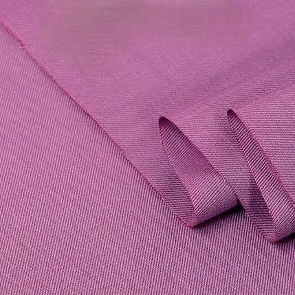 Close-up of Longan Craft’s Twill Cotton Lyocell Fabric By The Yard in dusty pink, showing its smooth, fine texture and weave—ideal comfy and breathable material for shirts.