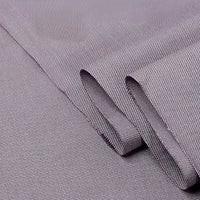 Close-up of folded Twill Cotton Lyocell Fabric by the yard from Longan Craft, highlighting its fine diagonal weave and smooth, eco-friendly cotton lyocell surface—ideal comfy and breathable material for shirts.