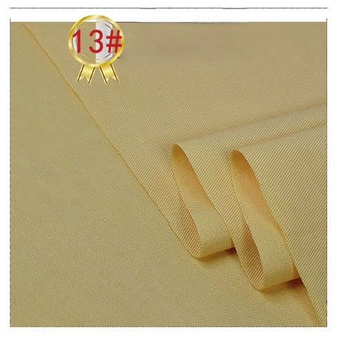 Longan Craft’s Twill Cotton Lyocell Fabric By The Yard is shown folded in light yellow with a smooth, slightly textured surface. A gold 13# ribbon appears inside a red circle at the top left corner.