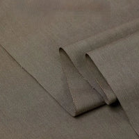 Longan Craft's Twill Cotton Lyocell Fabric By The Yard, a finely woven, solid khaki brown material with a subtle diagonal pattern, is displayed flat—perfectly comfy and breathable for shirts.
