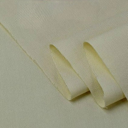 A close-up of Longan Craft’s Twill Cotton Lyocell Fabric By The Yard, a comfy and breathable solid color fabric with a subtle diagonal weave, showcasing its soft folds and smooth texture—ideal for eco-friendly shirts.