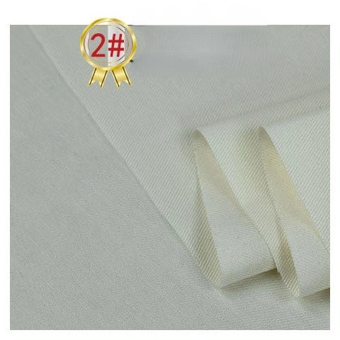 A close-up of Longan Craft's Twill Cotton Lyocell Fabric By The Yard in off-white, folded on a flat surface, with a gold badge featuring "2#" in red at the top left corner.