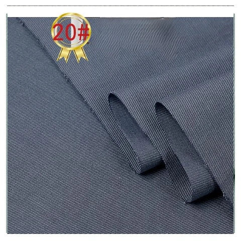 Close-up of Longan Craft’s dark gray Twill Cotton Lyocell Fabric By The Yard, showing subtle diagonal texture and partial folds, with a gold 20# badge in the top left corner. Comfy, breathable material ideal for shirts.