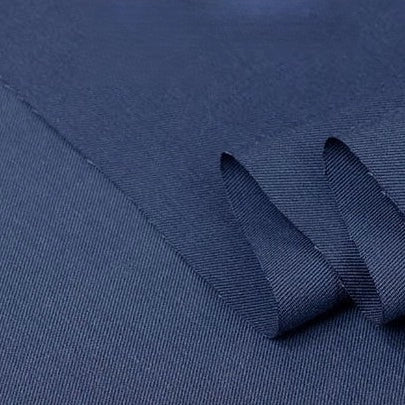 A close-up of Longan Craft’s Twill Cotton Lyocell Fabric By The Yard shows its smooth, tightly woven texture and subtle diagonal lines. This comfy, breathable, eco-friendly material is ideal for shirts.