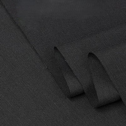 Close-up of Longan Craft’s Twill Cotton Lyocell Fabric By The Yard, featuring a smooth matte finish and fine weave. This comfy, breathable cotton lyocell textile is perfect for shirts and showcases its dense, durable quality when folded.