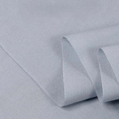 Longan Craft's Twill Cotton Lyocell Fabric By The Yard is a solid color, comfy and breathable textile with a fine weave, soft texture, and gentle drape—perfect for shirts. Shown neatly folded to highlight its smooth, slightly shiny surface.
