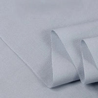Longan Craft's Twill Cotton Lyocell Fabric By The Yard is a solid color, comfy and breathable textile with a fine weave, soft texture, and gentle drape—perfect for shirts. Shown neatly folded to highlight its smooth, slightly shiny surface.