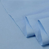 Longan Craft's Twill Cotton Lyocell Fabric By The Yard features a comfy, breathable solid color material, neatly folded to show its smooth texture and subtle diagonal weave—ideal for shirts, clothing, or crafts.