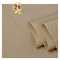 Longan Craft's Twill Cotton Lyocell Fabric By The Yard, a comfy and breathable textile for shirts in solid beige with a subtle diagonal weave, is shown neatly folded with a gold ribbon marked 7# in red at the top left corner.