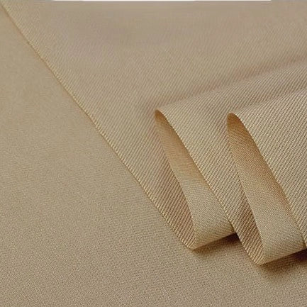 A close-up of Longan Craft’s Twill Cotton Lyocell Fabric By The Yard shows its smooth, soft texture and slight folds—a comfy, breathable solid color material perfect for shirts.