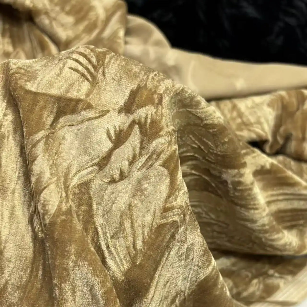 A close-up of golden-beige Velvet Damask Fabric By The Yard from Longan Craft, featuring a classic jacquard damask weave and shimmering texture—ideal for luxury dressmaking or upholstery.