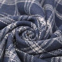 Close-up of Longan Craft’s Vintage Checked Mammoth Flannel Fabric By The Yard, featuring a blue and white gingham pattern swirled in a spiral, showcasing the thick cotton flannelette’s soft texture and intersecting lines—perfect for cozy fall sewing projects.