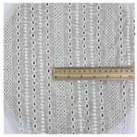 A piece of Longan Craft White Floral Eyelet Embroidered Voile Fabric (100% cotton), shown with a 20cm ruler for scale. This hollow out embroidery material is ideal for dressmaking and sold by the yard.