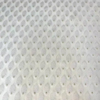 A close-up of Longan Craft’s White Leaf Pattern Organza Fabric by the yard shows a light, slightly reflective jacquard with raised oval bumps and tiny center holes, ideal for clothing and featuring a botanical-inspired design.