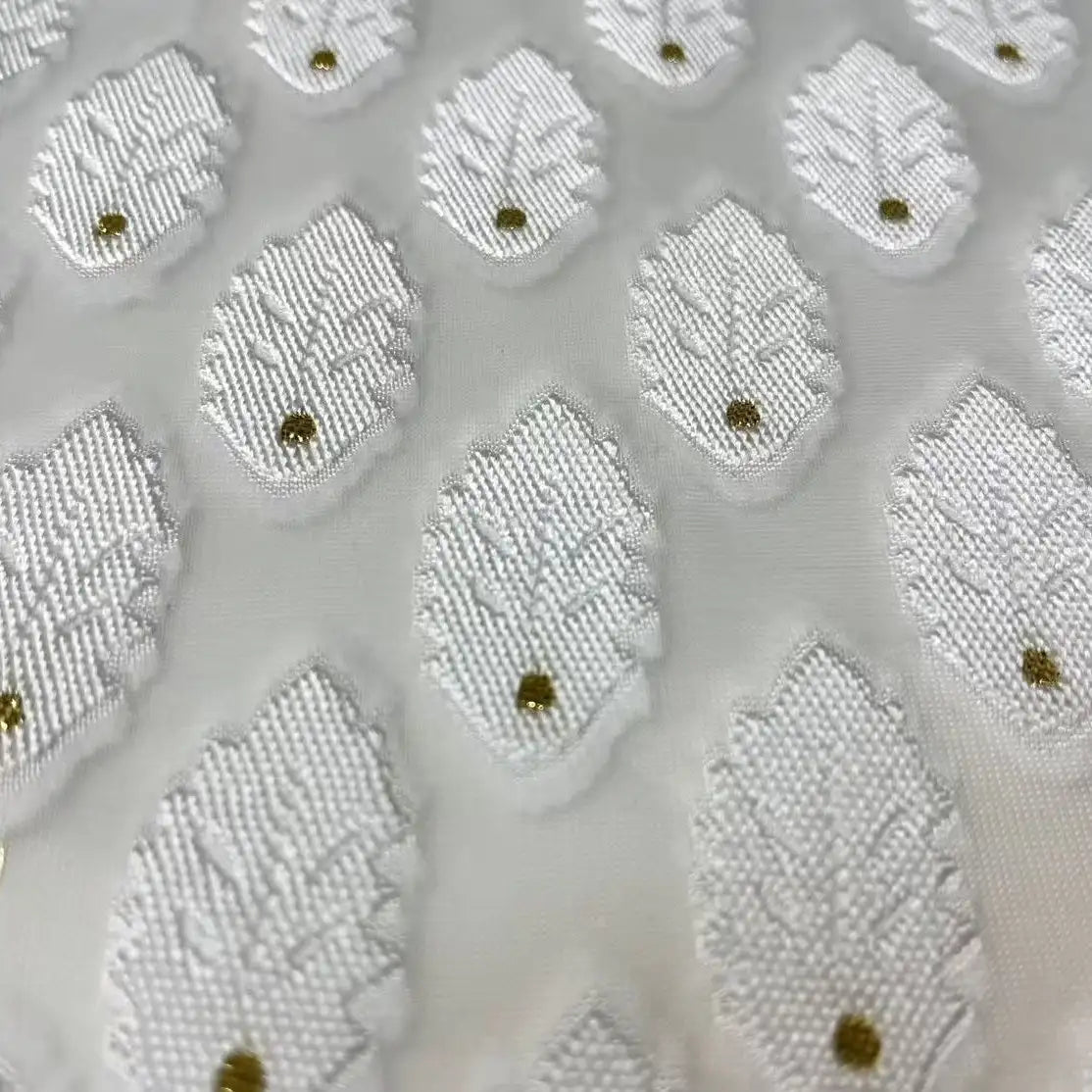 Close-up of Longan Craft’s White Leaf Pattern Organza Fabric by the yard, a sheer botanical jacquard with raised embroidered leaves and gold dots in a geometric layout—ideal organza material for clothing.