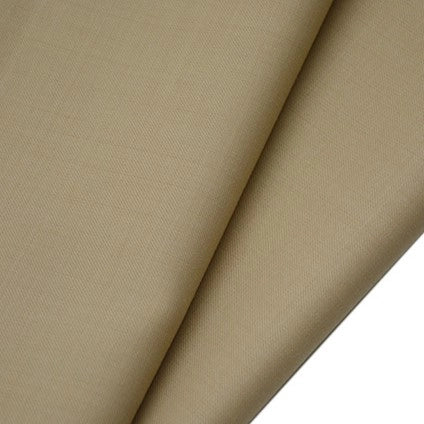 A close-up of Longan raft's Worsted Wool Gabardine Fabric By The Yard shows its smooth, tightly woven poly wool blend in a light tan shade—durable and wrinkle-resistant, ideal for tailored suits.