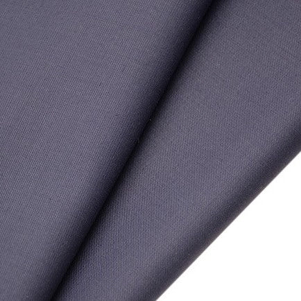 Close-up of two overlapping pieces of Longan raft Worsted Wool Gabardine Fabric By The Yard, a colorful poly wool blended twill gabardine textile with fine texture, durable for tailored suits.