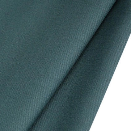 A close-up of Longan raft’s Worsted Wool Gabardine Fabric By The Yard, a colorful poly wool blended twill gabardine textile with a smooth, wrinkle-resistant finish and durable diagonal weave—ideal for tailored suits.