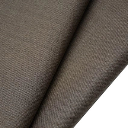 Close-up of Longan raft Worsted Wool Gabardine Fabric by the yard—a colorful poly wool blended twill with a smooth, fine weave. Durable and ideal for tailored suits, its soft texture is shown folded at an angle.