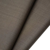 Close-up of Longan raft Worsted Wool Gabardine Fabric by the yard—a colorful poly wool blended twill with a smooth, fine weave. Durable and ideal for tailored suits, its soft texture is shown folded at an angle.
