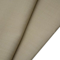 A close-up of two overlapping pieces of Longan raft Worsted Wool Gabardine Fabric in beige, featuring a smooth, tightly woven texture. This durable poly wool blend twill is ideal for tailored suits and available by the yard.