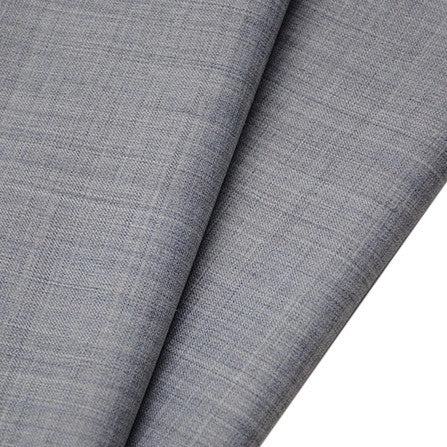 A close-up of folded grey Worsted Wool Gabardine Fabric by Longan raft, a wrinkle-resistant, durable poly-wool blended twill ideal for tailored suits.