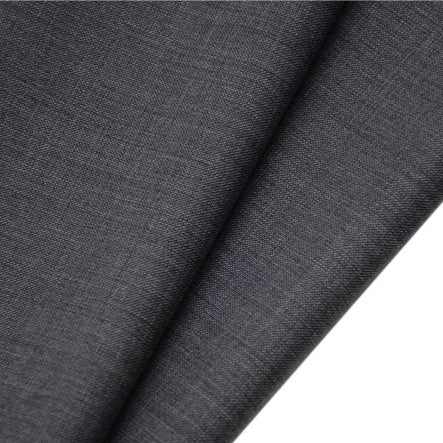 A close-up of Longan raft’s Worsted Wool Gabardine Fabric by the yard, a durable poly wool blended twill in dark gray, neatly folded to show its wrinkle-resistant, finely textured surface—ideal for tailored suits.